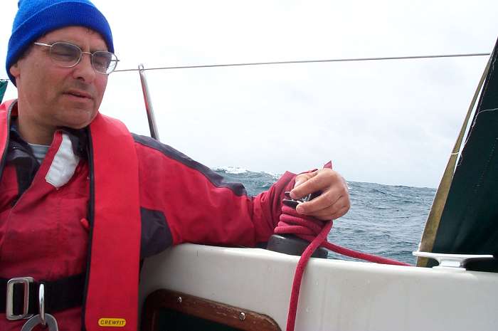 Skipper on the helm while mate dries off!